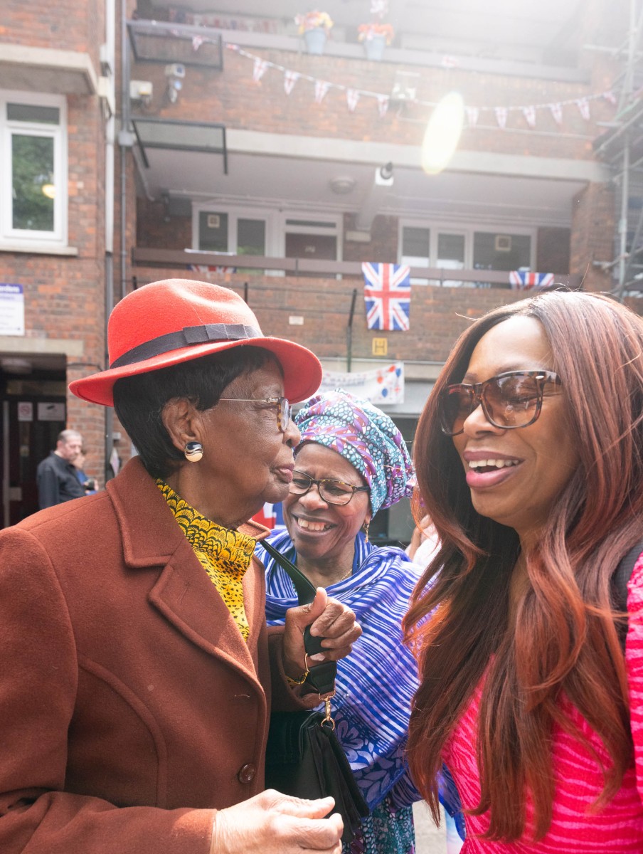 Residents laughing at the Carey Gardens Jubilee celebration